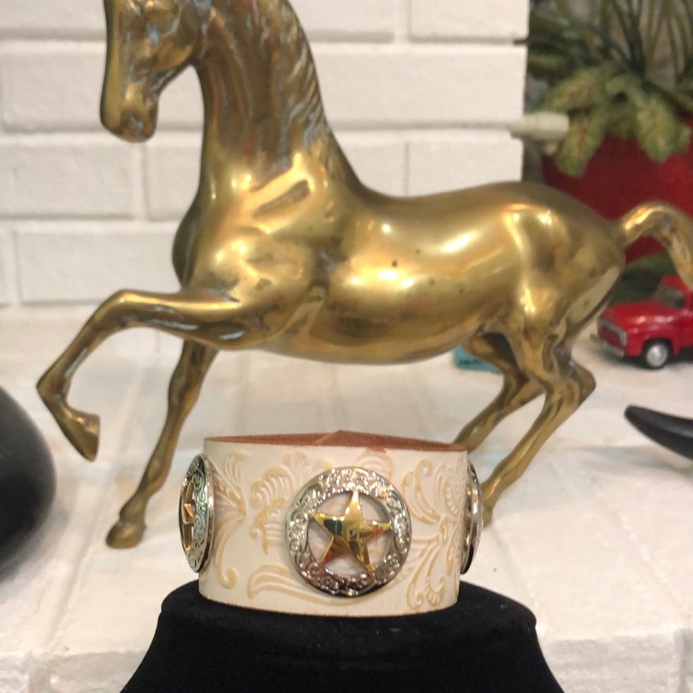 Embossed leather cuff bracelet, star Conchos